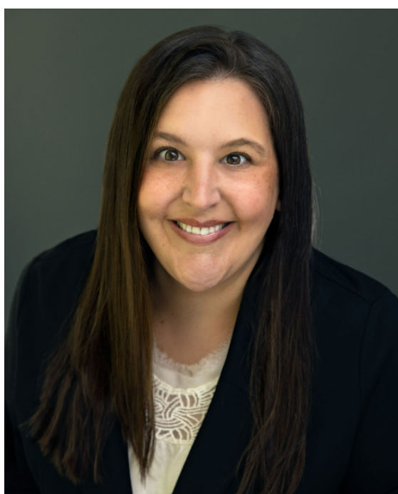 Headshot of Caren E. Short in a black blazer